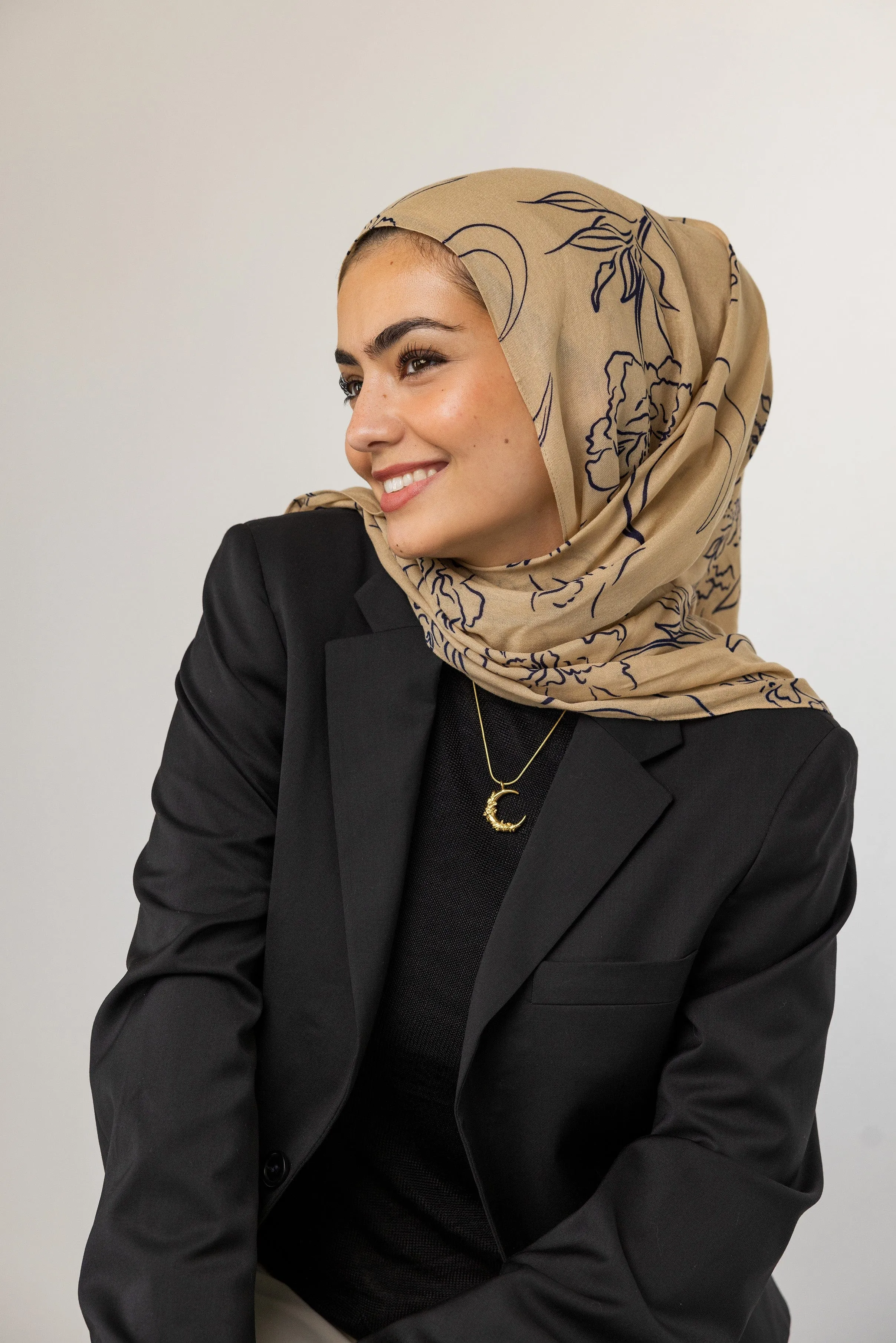 Crescent Shaped Jasmine Necklace by VELA and Nominal